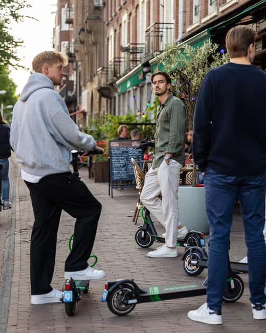 Amsterdam: Elec. Scooter Tour Golden Hidden A'dam (3h) - Discovering Amsterdam on an Electric Scooter