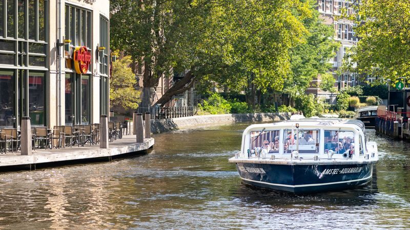 Amsterdam Evening Canal Cruise with Snackbox - Amsterdam’s canals after dark