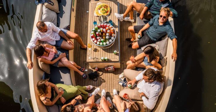 Amsterdam: German Guided Open Boat Cruise With Bar Onboard - Experience Highlights