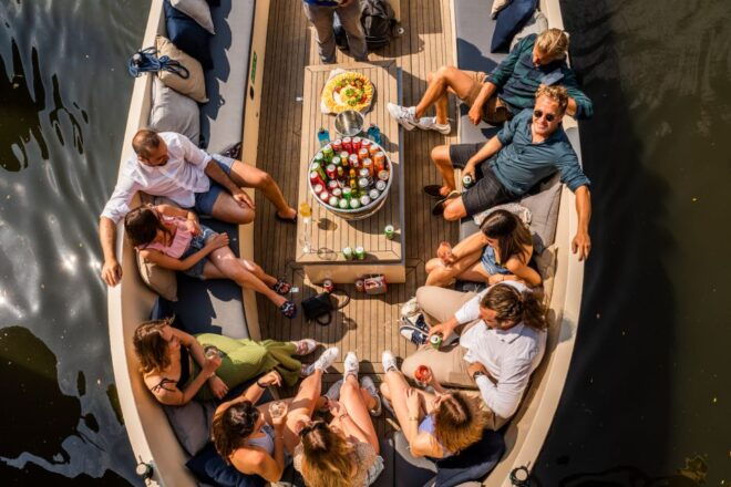 Amsterdam: German Guided Open Boat Cruise With Bar Onboard - Inclusions
