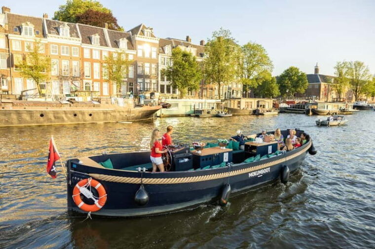 Amsterdam: Guided Open Boat Canal Cruise Including Drink - The Experience in Detail