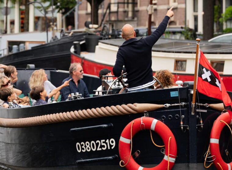 Amsterdam: Guided Open Boat Canal Cruise Including Drink - Pricing and Value