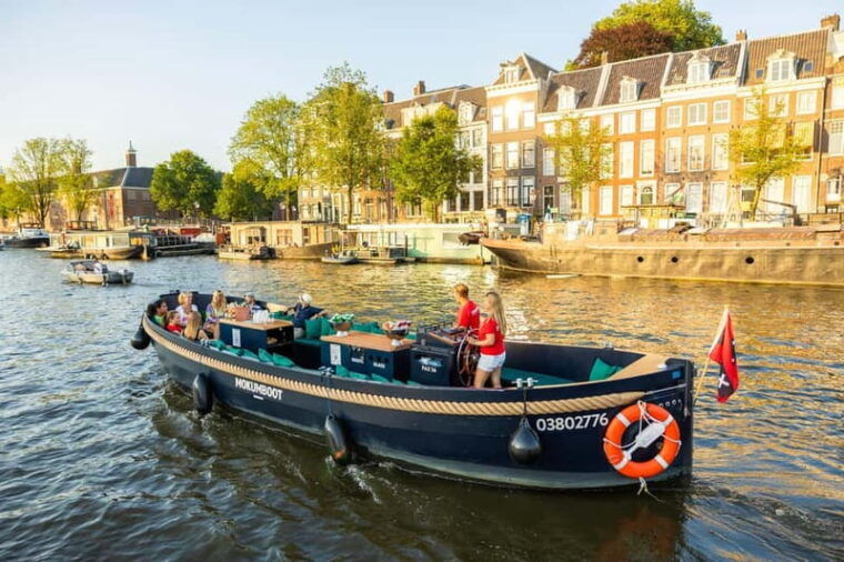 Amsterdam: Guided Open Boat Canal Cruise Including Drink - Who Is This Tour Best For?