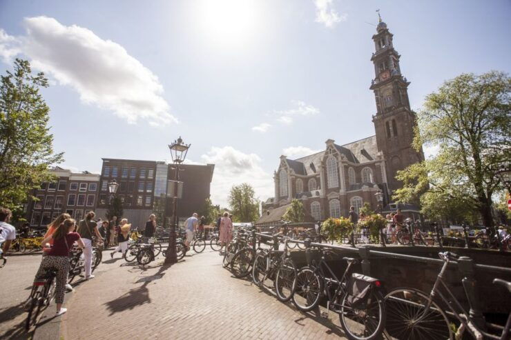 Amsterdam: Hidden Gems & Highlights Guided Bike Tour - Activity Duration and Availability