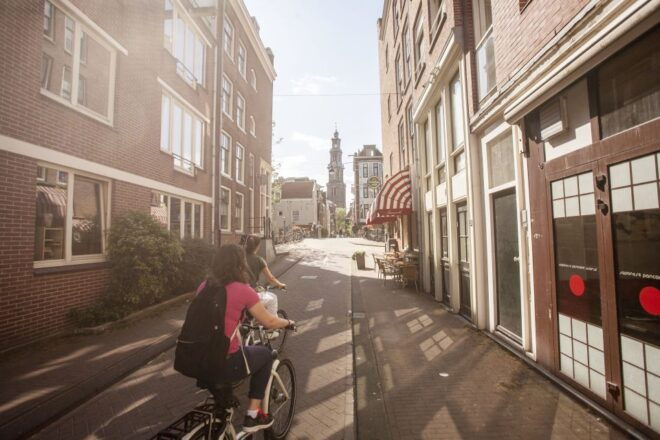 Amsterdam: Hidden Gems & Highlights Guided Bike Tour - Inclusions and Amenities