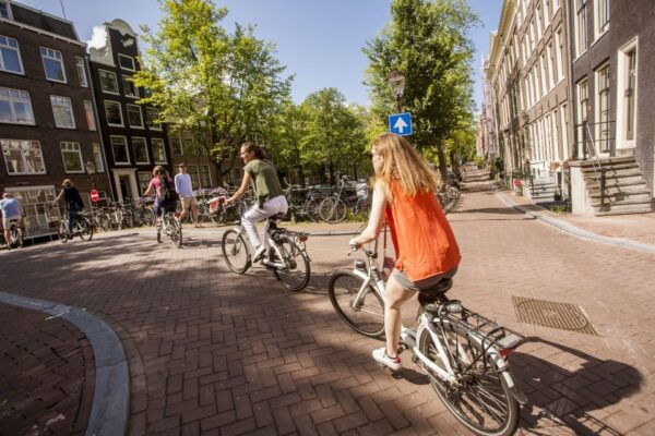Amsterdam: Hidden Gems & Highlights Guided Bike Tour - Detailed Activity Description