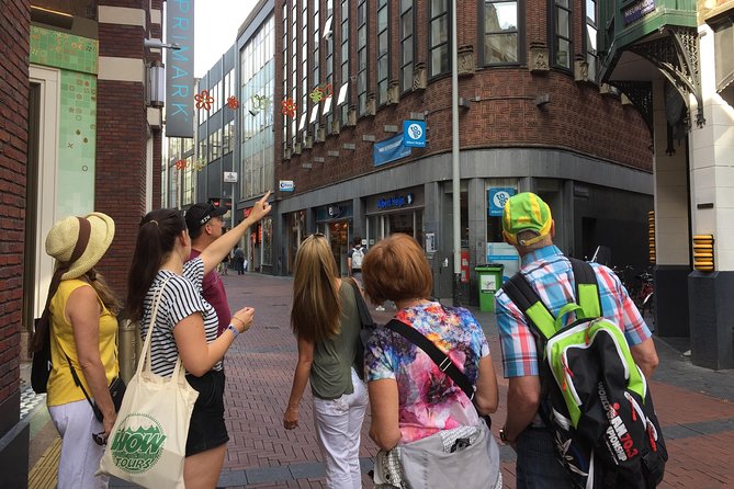 Amsterdam Highlights Small-Group Walking Tour - Tour Guide Expertise and Interactivity