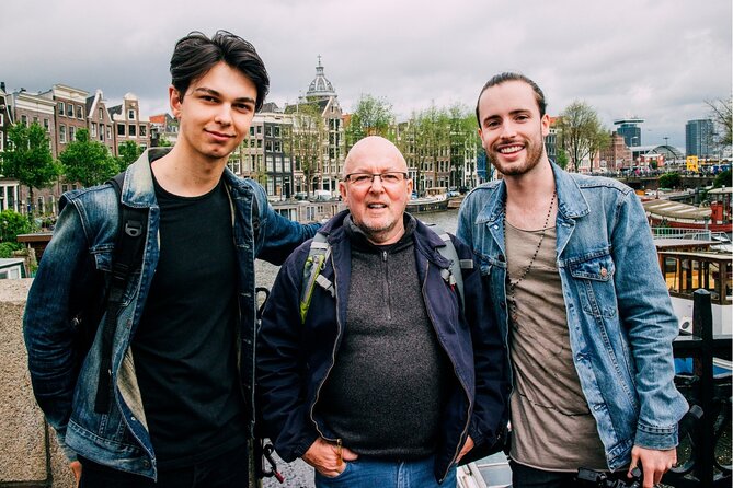 Amsterdam Highlights With Local: Walking Tour & Canal Cruise - Historic City Center