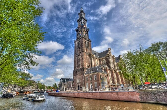 Amsterdam Highlights With Local: Walking Tour & Canal Cruise - Local Food and Markets