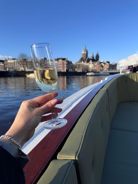 Amsterdam: Historic Boat Cruise with open bar and nibbles - The Itinerary Breakdown