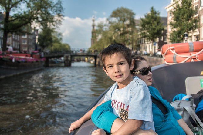 Amsterdam: Kid-Friendly Barge Cruise, Canal Museum & City Walk Private Tour - Meeting and Pickup