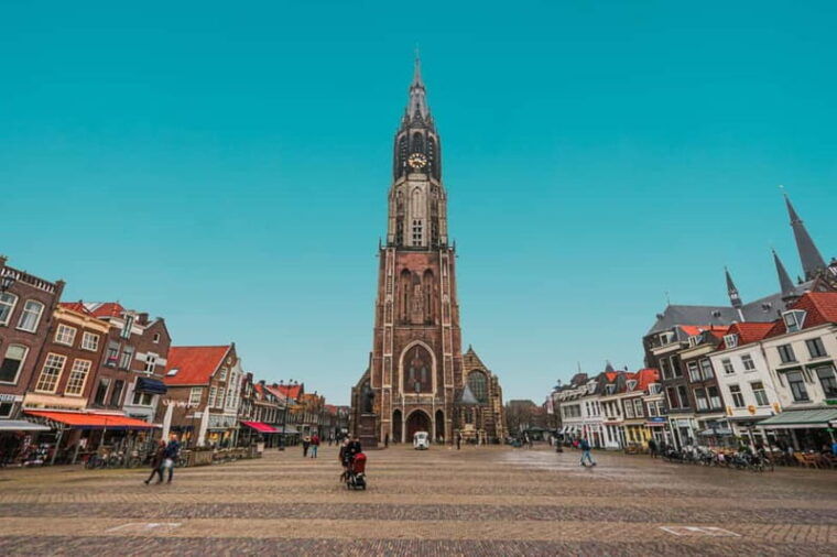 Amsterdam: Kinderdijk, Euromast, Delft and Den Haag Day Tour - Authentic Experiences from Other Travelers