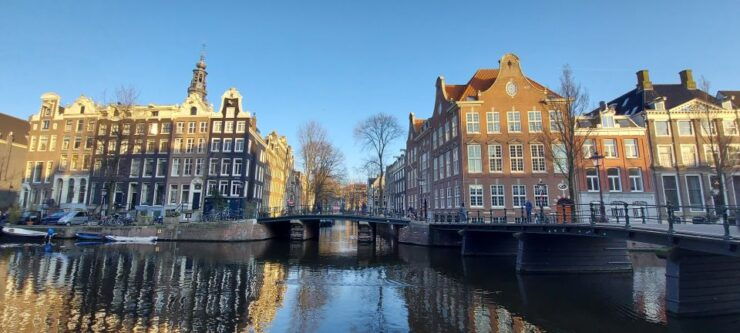 Amsterdam: Layover Sightseeing Tour With Airport Transfer - Duration and Highlights