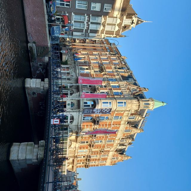 Amsterdam: Layover Sightseeing Tour With Airport Transfer - Location and Product Details