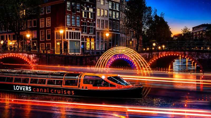 Amsterdam Light Festival 2026 - 2027 | Lovers Canal Cruise Amsterdam - Seats, sound, and the view through glass