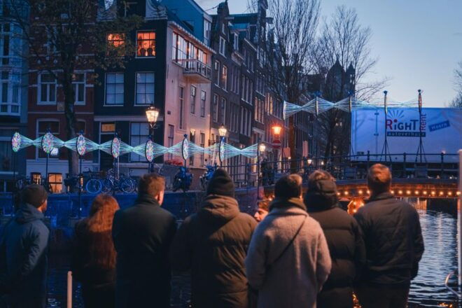 Amsterdam: Light Festival Guided Walking Tour With Hot Drink - Inclusions