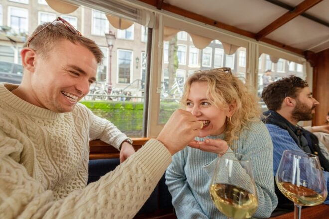 Amsterdam: Luxury Cheese & Wine Cruise With Unlimited Drinks - Historic Ship Setting the Cruise Scene