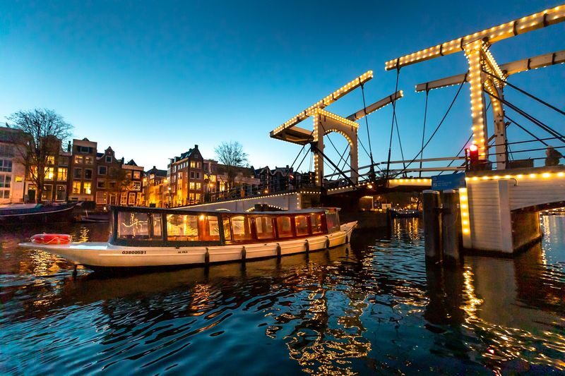 Amsterdam: Luxury Evening Canal Cruise - Amsterdam after dark, seen from the canals