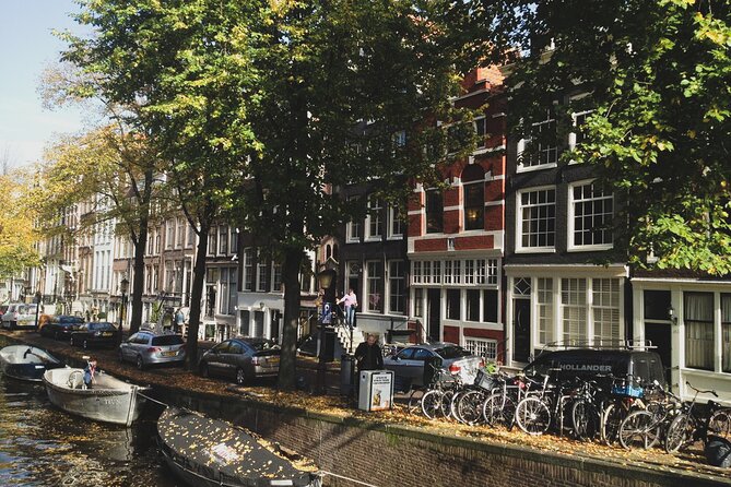 Amsterdam Must-See Bike Tour With a Local Expert Guide - Cafe Scene and Local Life