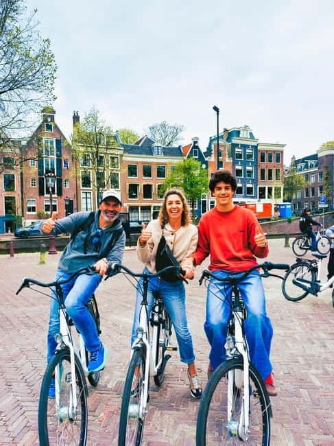 Amsterdam: Off the Beaten Path Bike Tour in French - Authentic Experiences & Real Feedback