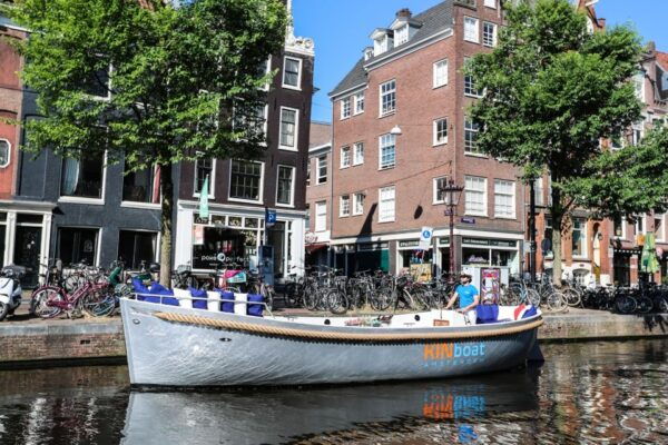 Amsterdam: Open Boat Canal Cruise With Local Guide - The Sum Up