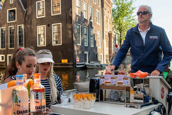 Amsterdam Open Boat Canal Cruise With Onboard Bar - Tour Highlights
