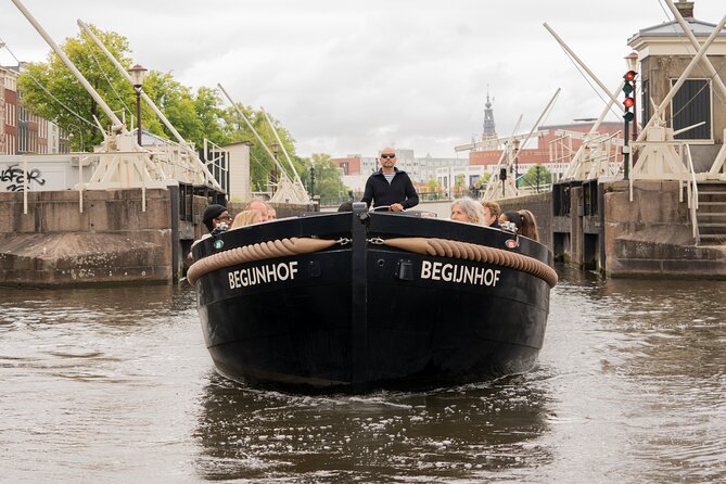 Amsterdam Open Boat Evening Canal Tour Local Guide and Open Bar - Pricing Information