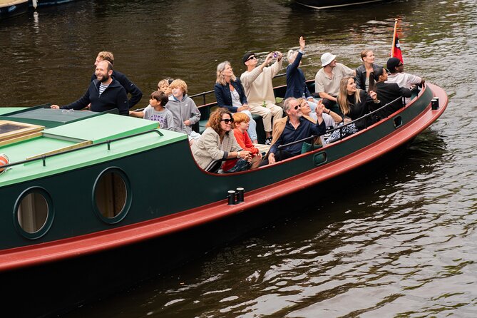 Amsterdam Open Boat Evening Canal Tour With Guide & Bar on Board - Additional Information