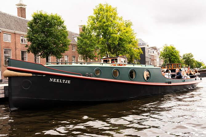 Amsterdam Open Boat Evening Canal Tour With Guide & Bar on Board - Cancellation Policy