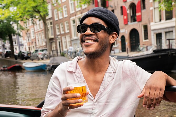 Amsterdam Open Boat Evening Canal Tour With Guide & Bar on Board - Reservation Instructions