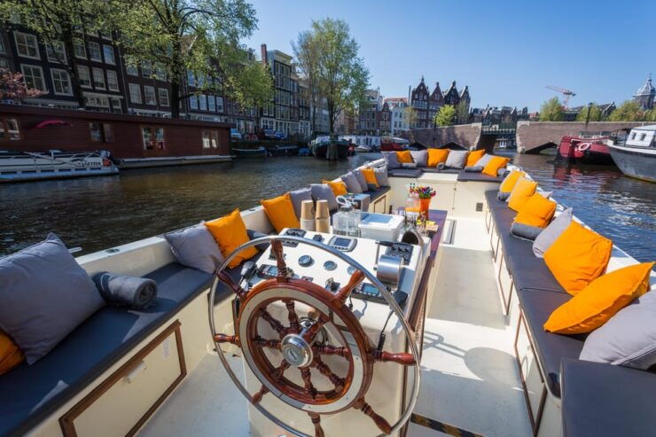 Amsterdam: Private Canal Cruise in German + Unlimited Drinks - Pricing and Booking
