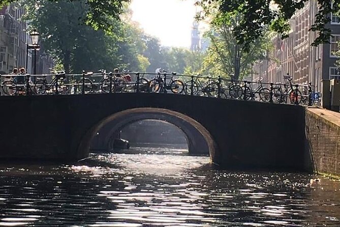 Amsterdam Private Canal Cruise With Live Guide and Drinks - The Sum Up