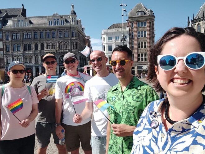Amsterdam: Queer City Walking Tour With Local Guide - Meeting Point and Guide Identification