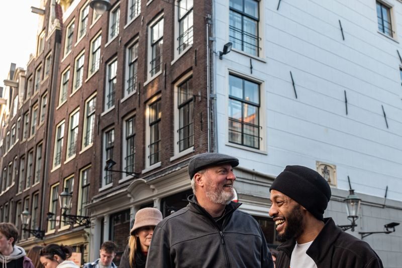 Amsterdam Red Light District 2-Hour Private Walking Tour - Narrow lanes, old buildings, and canals