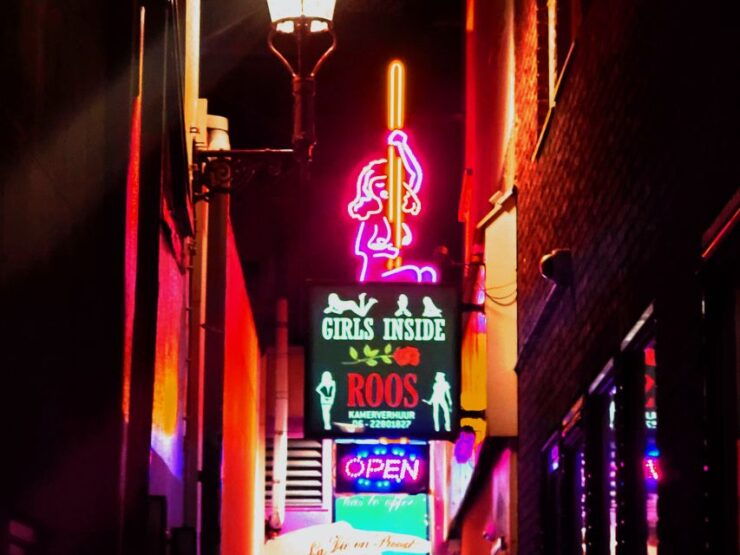 Amsterdam: Red Light District and Coffeshop Walking Tour - Experience Highlights