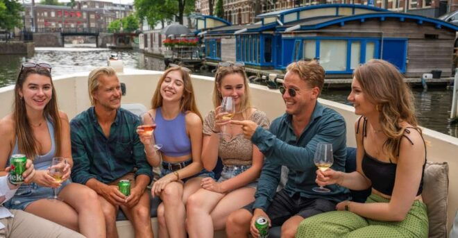 Amsterdam: Red-Light District Pub Crawl and Booze Boat Tour - Fun Drinking Games and Prizes