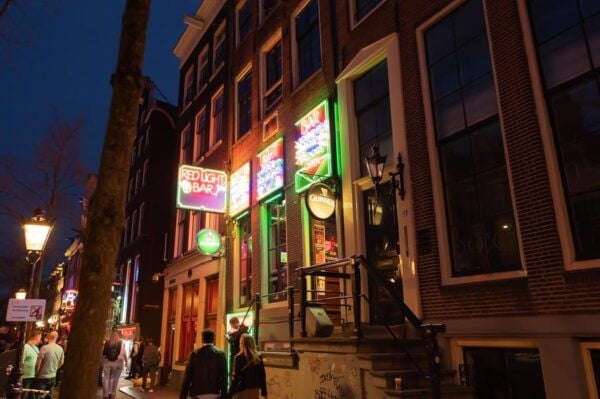 Amsterdam: Red Light Tour Exclusive and Peep Show - Prohibited Activities and Weather Policy