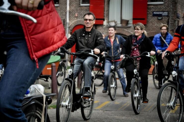 Amsterdam: Sightseeing Bike Tour With a French Guide - Experience