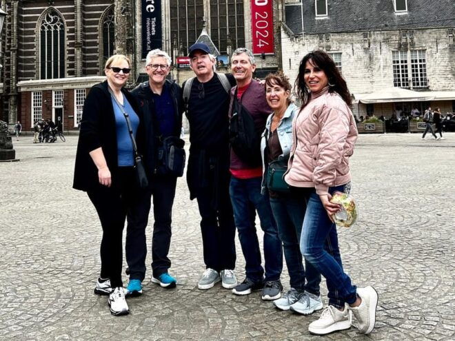 Amsterdam: Small Group Walking Tour With Fun Guide - Architectural Gems and Hidden Gardens