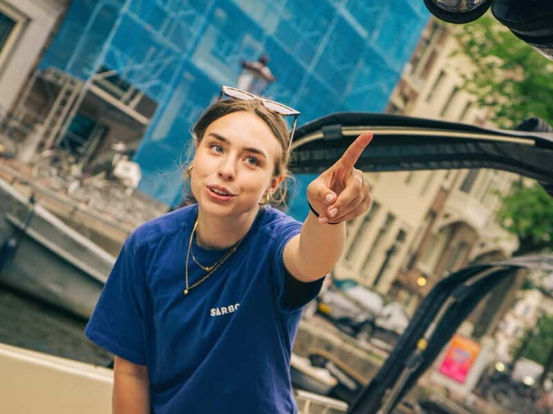 Amsterdam: Spanish Guided Open Boat Cruise with Bar Onboard - The Experience in Detail