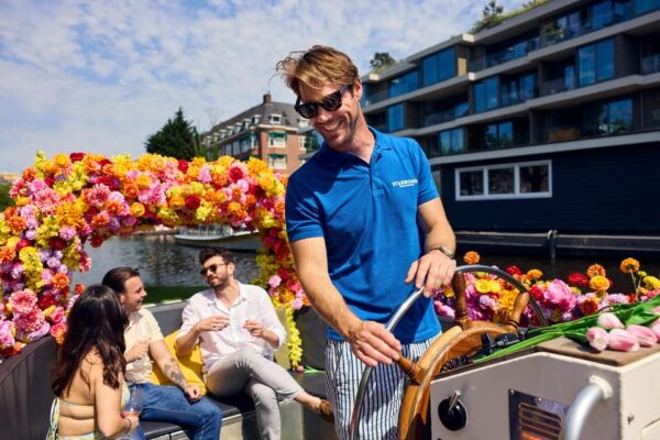 Amsterdam: the Original Flower Boat With Local Guide and Bar - Supporting Charity Foundation