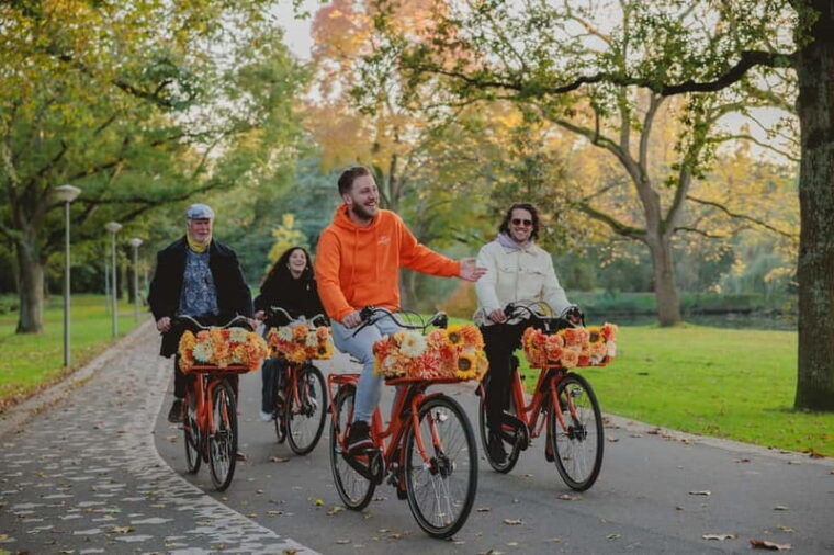 Amsterdam: Top Highlights Guided Bike Tour EN/DE/ES/FR/IT/CN - What Makes This Tour Stand Out?