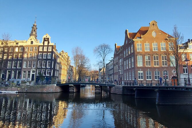 Amsterdam: Walking Tour, Canal Cruise and Transfer - Pricing and Terms