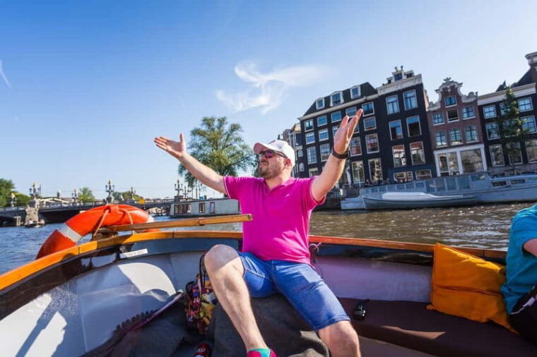 Amsterdam:1.5-Hour Canal Cruise local Guide, Drinks & Snacks - What to Expect During the Cruise