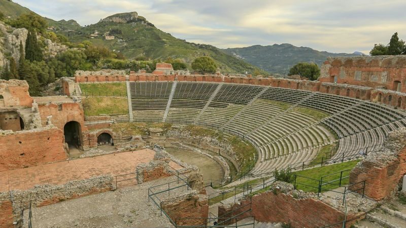 Ancient Theater of Taormina ticket with audio guide - Start with the Greek shape and Roman alterations