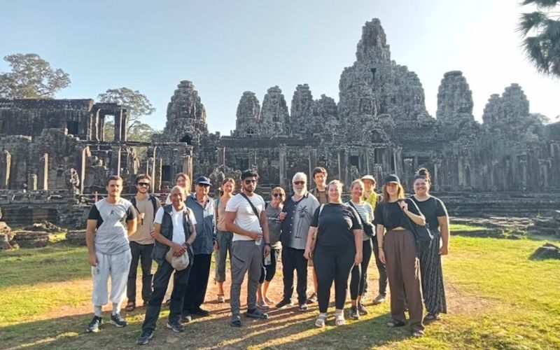 Angkor Temples Sunrise Tour - Bayon: faces looking in every direction