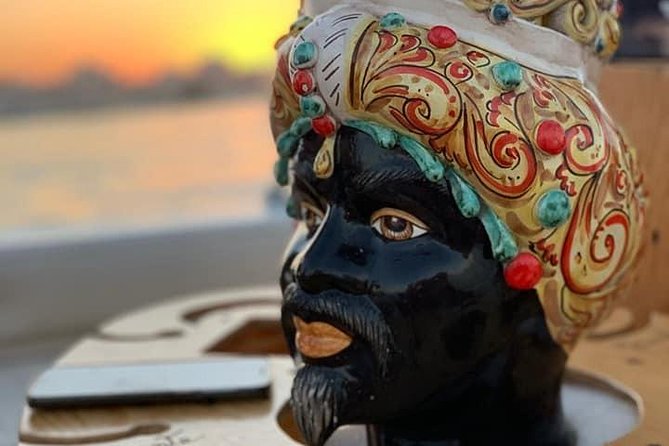 Aperitif on the Boat at Sunset Island and Sea Caves - Pricing and Booking Details