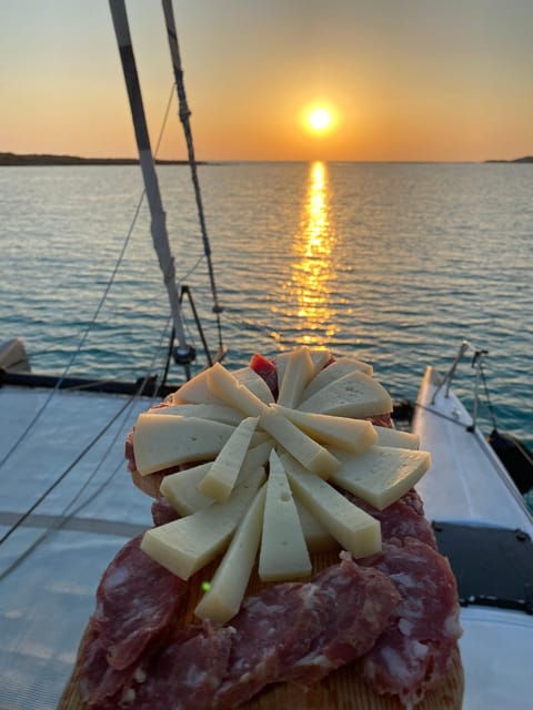 Aperitifs at Sunset on the Asinara Stintino Catamaran - Culinary Delights on Board
