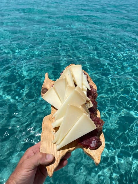 aperitifs at sunset on the Stintino catamaran burianaCharter - Why This Tour Offers Great Value