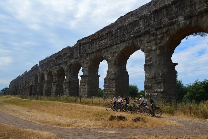 Appian Way Bike Tour Underground Adventure With Catacombs - Inclusions: Helmets, Phone Holders, and Child Seats